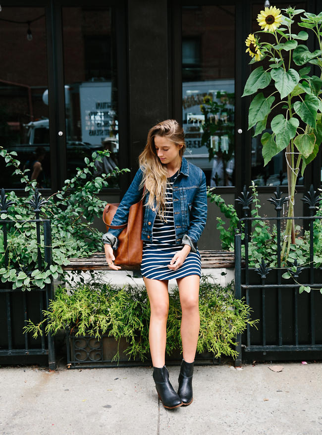 Fernanda wears our Cointoss Dress, Jean Jacket and her own boots.