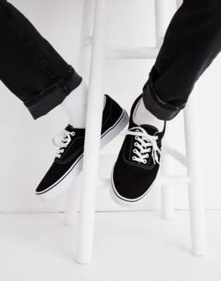 vans era black canvas