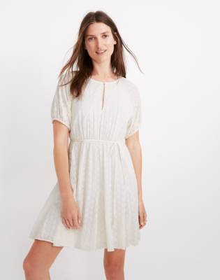 white eyelet mini dress