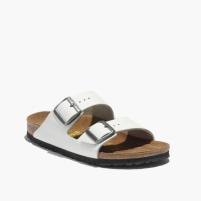 white birkenstocks with black bottom