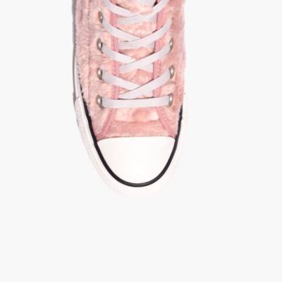 pink converse with fur