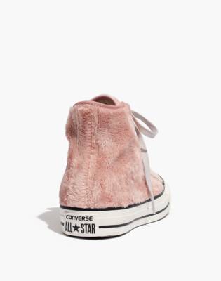 pink converse with fur