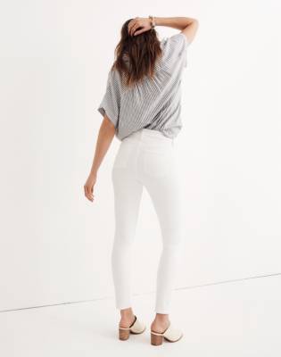 white mid rise skinny jeans