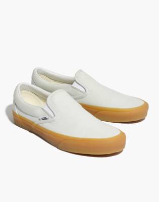 solid yellow vans slip on