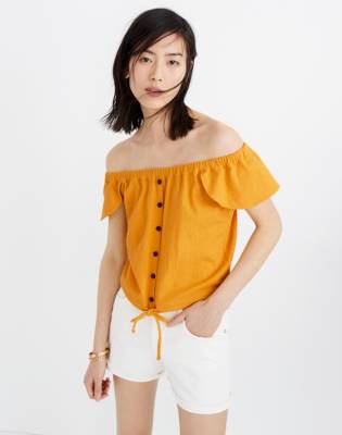 white off the shoulder top with ruffles