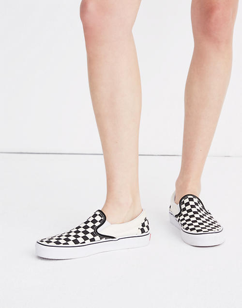 Vans® Unisex Slip-On Sneakers in Black Checkerboard