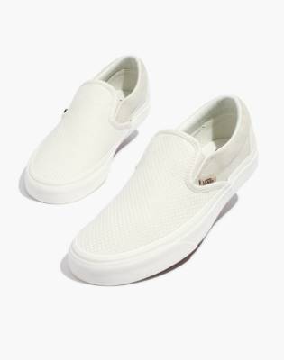 solid white slip on vans