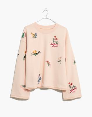 sweatshirt with embroidered flowers