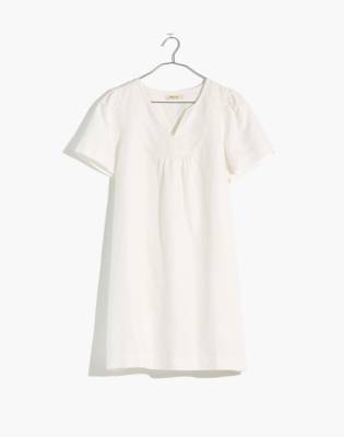 white linen swing dress