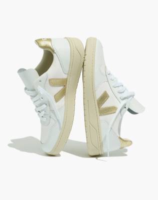 veja white and gold trainers