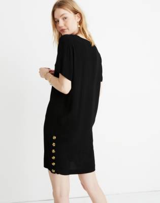 black dress with buttons on the side