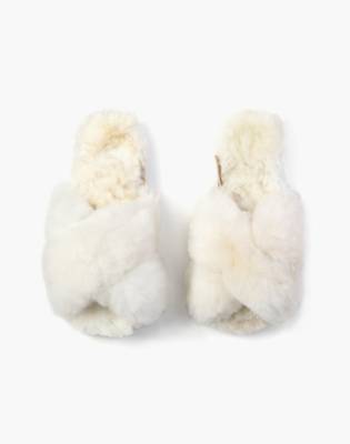 white criss cross slippers