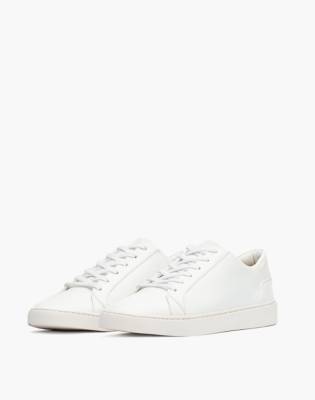 white leather lace up sneakers